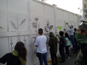 Foto: Comienzo del mural en el INPI recordando la lucha de Samir Flores. 20/10/2020